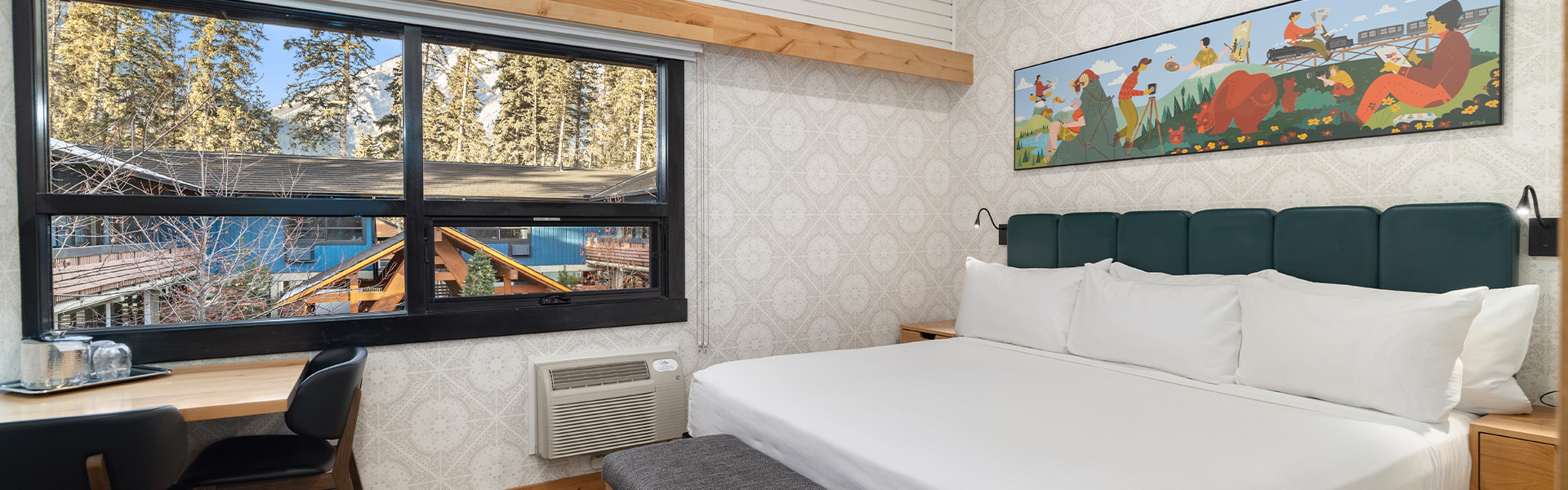 King bed in a Superior Hotel Room at The Dorothy Motel in Banff